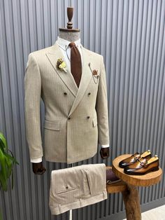 Introducing our Beige Striped Double Breasted Suit – a sophisticated and versatile choice for your formal wardrobe, designed by HolloMen. This impeccably tailored ensemble features a subtle striped pattern, adding a touch of contemporary refinement to the classic beige suit. From HolloMen Spring Summer Collection. Fabric: 63% Polyester, 34% Viscone, 3% Elastane. Features: Elegant beige color with subtle stripes for a distinguished appearance Double-breasted design for a polished and modern look Double Breasted Pinstripe Suit, Costume Beige, Beige Suit, Men's Business Suits, Suit Pin, Beige Suits, Slim Fit Suits, Pinstripe Suit, Slim Fit Suit