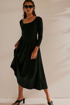 The perfect mix of cozy and effortless, this sweet midi from our free-est collection will turn heads with every wear. **Fit:** Slim at the bodice with dropped A-line skirt **Features:** Scoop neckline, flattering curved waistline, flared skirt design, side pockets **Why We ❤ It:** Elevated with ease in simple stilettos or laid back with low sneakers, this style has endless ways to wear. | Aelia Drop-Waist Midi Dress by free-est at Free People in Black, Size: XS Midi Dress Black, Loungewear Jumpsuit, Casual Rompers, Tube Dress, Skirt Design, Romper With Skirt, Flared Skirt, Black Solid, Drop Waist