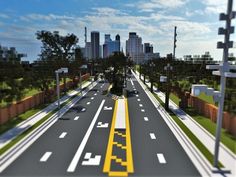 an artist's rendering of a city street with trees and buildings in the background