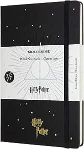 a harry potter notebook with stars and the words's logo on it, is shown