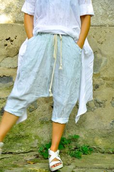 "Linen Pants, Harem Pants, Drop Crotch Pants ◾ Light blue LINEN pants. Loose harem pants. Summer comfortable quality linen pants. Light blue pants of high-quality linen. Elastic westband. Two pockets. The pants are very comfy. They have a sporty elegant style. Loose fitting. ◾ The clothes are truly boutique! ◾ I'm Glad that you came into my boutique :) ✂ Fabric: 100% lINEN Color:Light Blue ◾ The style was originally designed and professionally constructed by me. Each item of my shop is specially Spring Short Pants With Hip Pockets, Blue Baggy Short Bottoms, Baggy Blue Linen Bottoms, Spring Harem Pants With Hip Pockets, Baggy Blue Linen Pants, Straight Pants With Hip Pockets For Summer, Summer Straight Pants With Hip Pockets, Baggy Blue Shorts, Linen Short Pants With Pockets