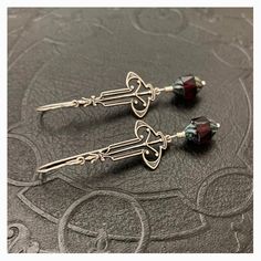 "Handmade Sterling silver ear wires available, Vintage style, Vintage Silver Art Deco, Garnet birthstone, fancy Czech glass, Victorian, Romantic, Bridesmaid earrings, Vintage Gold Art Deco, Gifts for her, Bridal. ~ Eleanor ~ This ornate, vintage inspired design is beautifully detailed and feminine. I paired these elegant drops with fancy, Czech garnet Picasso turbine glass beads, adding the perfect touch of sophistication. Great January Birthday gift (Garnet Czech Glass). Perfect for the woman w Elegant Red Czech Glass Earrings, Elegant Formal Jewelry With Czech Glass, Elegant Czech Glass Jewelry For Formal Occasions, Elegant Czech Glass Earrings For Pierced Ears, Victorian Red Earrings As Gift, Elegant Czech Glass Earrings For Jewelry Making, Red Victorian Earrings As Gift, Elegant Czech Glass Earrings, Nickel-free Art Nouveau Earrings As Gift