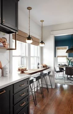 the kitchen is clean and ready to be used as a dining room or breakfast nook