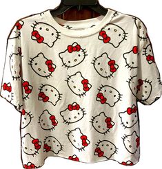 Hello Kitty Print Crew Neck Top For Summer, Casual Hello Kitty Print Tops For Spring, Spring Casual Hello Kitty Print Tops, Cute Red Crew Neck Top, Red Hello Kitty Print Crew Neck Top, Red Crew Neck Top With Hello Kitty Print, Spring Cotton Tops With Hello Kitty Print, Fun White Printed Tops, Casual Cotton Hello Kitty Print Top