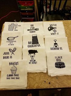 six tea towels with different types of baking and baking related designs are laid out on a table