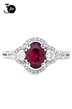 1.25 CTS Red Ruby and 0.43 CTS White Diamond 18K White Gold Ring. Measures approximately 0.96"L X 0.80��� W and has a finished under-gallery. Ring comes with a GCAL Lab Report. Exquisite Oval Ruby Ring Gia Certified, Luxury Red Cluster Diamond Ring, Gia Certified Round Cut Ruby Ring Fine Jewelry, Gia Certified Round Cut Ruby Ring, Classic Red Cluster Ruby Ring, Classic Red Ruby Cluster Ring, Gia Certified Fine Jewelry Red Ruby Ring, Red Brilliant Cut Cluster Ring For Promise, Red Cluster Ring With Brilliant Cut For Promise