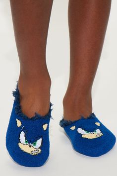 Available In Blue. Sonic Inspired Fuzzy Ankle Slippers Shell: 98% Polyester 2% Spandex, Lining:100% Polyester SM=8-13 , ML=13-4 Model Wears Size ML M/L fits Shoe Size:7 1/2-3 1/2, sock Size: 6-8 1/2 Imported | Mini Sonic Boys Fuzzy Ankle Slipper in Blue by Fashion Nova Ankle Slippers, Boys Slippers, Sock Shoes, Boys Shoes, Blue Fashion, Kids Accessories, Sonic, Fashion Nova, Slippers