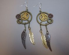 Steampunk Asymmetrical Feathers Dangly Earrings Clock Cogwheels - Etsy What Is Steampunk, Earrings Hearts, Oxford Dictionary, Steampunk Earrings, Dangly Earrings, Steam Punk, Beaded Jewelry Diy, Advanced Technology, Science Fiction