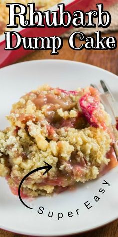 a close up of a piece of cake on a plate with the words rhubarb dump cake above it