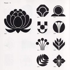 an image of flower emblems in black and white on a sheet of paper,