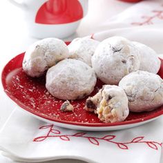 chocolate snowball cookies on a red plate