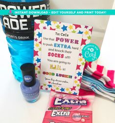 the contents of a personal care kit are displayed on a white table with blue and pink items