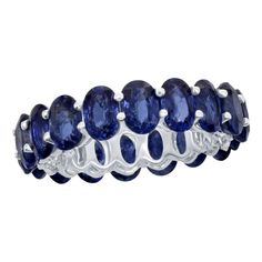 This stunning eternity band is made of 18 perfectly matched oval stones. The superb quality of this Ceylon sapphires make this ring a unique piece. The ring is set in 18K white gold, and the total weight of the ring is 12.45 carats. The size of the ring is 7. Sapphire Eternity Band, Modern Wedding Rings, Sapphire Eternity Ring, Star Sapphire Ring, Vintage Engagement Rings Sapphire, Sapphire Wedding, Bridesmaid Jewelry Sets, Modern Blue, Half Eternity Band