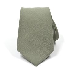 Handmade with 100% imported cotton fabric. Perfect for work, weddings or a night out on the town. This Linen Sage Green Tie will make you feel like the gentleman you aspire to be or accentuate the gentleman you already are. You’ll look good, feel good and do good things in this tie. Makes the perfect gift for a fellow gentleman or for that man in your life by making them look good and feel good. We guarantee your satisfaction with our free refund policy.* Goes Good With: Black, Grey, Tan, GreenM Formal Cotton Tie, Dapper Cotton Ties For Formal Occasions, Dapper Cotton Tie For Formal Occasions, Formal Dapper Cotton Ties, Elegant Cotton Suit And Tie Accessories For Wedding, Classic Cotton Ties For Black Tie Occasions, Formal Cotton Standard Tie Accessories, Elegant Cotton Ties For Spring, Dapper Cotton Suit And Tie Accessories For Formal Occasions