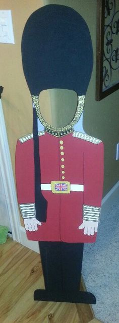 a cardboard nutcracker is standing on the floor