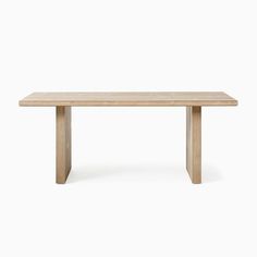 a wooden table on a white background with no one around it or the table top