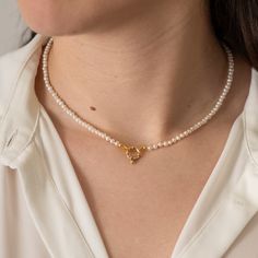 Our handcrafted Natural Freshwater Pearl Necklace is the perfect addition to any jewelry collection. The pearls and the elegant gold-plated silver clasp add a touch of luxury to your outfits, making this piece perfect for any occasion.
.
.
.
.
.
.
.
.
.
.
.
.
#pearl #necklace #pearlnecklace #pearljewelry #naturalpearls #naturalfreshwaterpearls #goldplatedclasp #claspnecklace #timeless #classic #modern #jewelry #choker #smallbusiness #etsyfinds #etsyjewelry #handmadejewelry Classic Handmade Necklaces For Everyday, Classic Handmade Necklace For Everyday, Handmade Minimalist Pearl White Jewelry, Everyday Pearl White Single Strand Jewelry, Pearl White Jewelry With Lobster Clasp For Gift, Elegant Adjustable Necklaces With Spring Ring Clasp, Gift Pearl White Necklace, Everyday Minimalist Handmade Pearl Necklace, Minimalist Single Strand Jewelry As A Gift