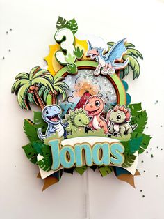 a close up of a sign with animals and plants on it's side that says jonas