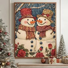 two snowmen standing next to each other in front of a christmas tree