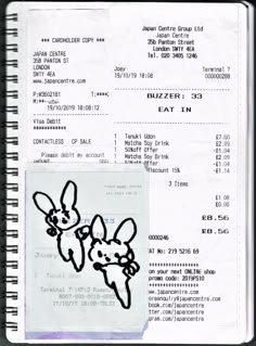 a receipt with an image of two rabbits on it