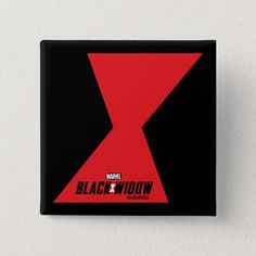 the black widow logo on a red and black square button that is mounted to a wall