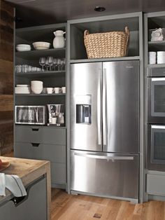 a large stainless steel refrigerator in a kitchen