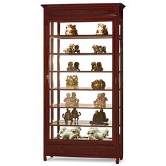 a wooden display case filled with lots of figurines