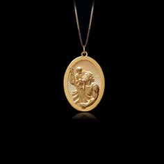 Carry the spirit of protection with the Gold St. Christopher Pendant. Crafted in lustrous Gold, this pendant features St. Christopher, the patron saint of travelers, known for his guidance and safety. The detailed design showcases his iconic image, making this pendant a meaningful accessory for those who seek reassurance and protection on their journeys. PENDANT INFORMATIONThis pendant is made of real, solid gold.• Made in USA• Material: 14k or 18k solid gold• Finish: polished• Height: 1.25" (31 Spiritual Charms Necklaces For Commemoration, Spiritual Medallion Pendant Necklace With Charms, Spiritual Oval Coin Pendant Medallion Necklace, Spiritual Medallion Necklace With Oval Coin Pendant, Amulet Pendant Necklace For Commemoration, Spiritual Medallion Necklace With Polished Finish, St Christopher Pendant, St Christopher, Saint Christopher