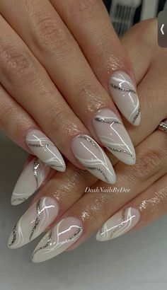 White Milky Wedding Nails Nail Art White And Silver, White Fancy Nails Art Designs, White Artsy Nails, Milky White And Silver Glitter Nails, White And Silver Marble Nails, Graduation White Nails, Elegant Almond Nails Classy 2024, Milky White Winter Nails, Silver Bridal Nails