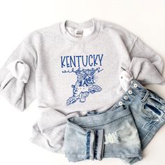 Vintage Wildcats Kentucky shirt!  Unisex Sizing!  The tee listed has the design on an ash gray shirt (1st photo), but we can also do on a different color!  For an option not listed, send us a message!  🔹T SHIRTS🔹 Adult S-XL Adult 2X Adult 3X 🔹LONG SLEEVE T SHIRTS & SWEATSHIRTS🔹  Adult S-XL  Adult 2X Adult 3X If you would like to request a custom order,   please send us a message! Game Day T Shirt, Kentucky Sweatshirt, Kentucky Shirts, Cats Shirt, Message T Shirts, Gildan Sweatshirt, Ash Gray, Gray Shirt, Gildan Sweatshirts