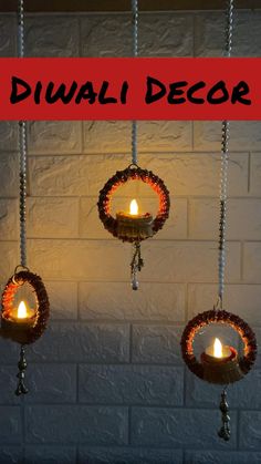 diwali decor hanging from chains with candles in them and the words diwali decoration above it