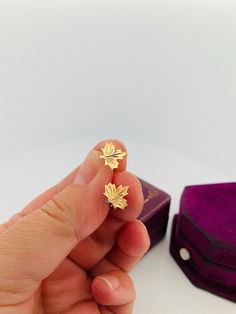 Welcome to Caviar and Cobwebs ! Thanks for stopping by. Enjoy browsing!  Here we have pretty and  simple pair of vintage maple leaf stud earrings. Crafted from 14k yellow gold, measuring approximately 8.8mm in size. Would make a great Canadian inspired gift! Gift wrapped and shipped safe and secure from Canada. Box for display purposes only* Antique Diamond Engagement Rings, Antique Diamond, Maple Leaf, Jewelry Earrings Studs, Diamond Engagement Rings, Jewelry Earrings, Accessory Gift, Yellow Gold, Stud Earrings