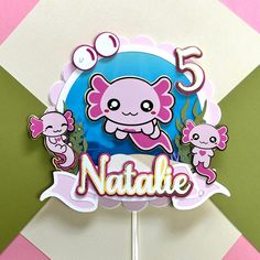 a cake topper with an image of a cartoon character on it and the number five