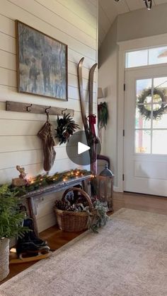 the entryway is decorated for christmas with wreaths and decorations