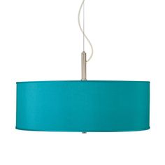 a blue drum light hanging from a ceiling fixture