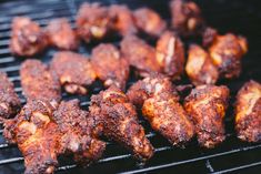 chicken is being cooked on the grill