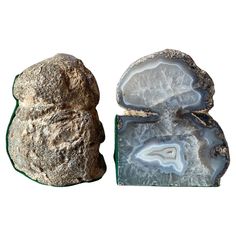 two pieces of rock are shown on a white background