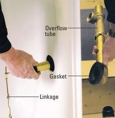 an image of a person fixing a shower faucet with the parts labeled below