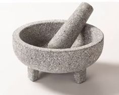 a mortar and pestle on a white background