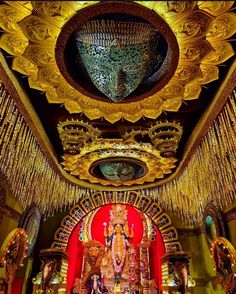 the interior of an ornately decorated temple