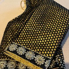 Very Beautiful Black And Golden Blouse With 3/4 Sleeves. Custom Made In India. Never Worn It Since It Was Too Big For Me. Size 38 Traditional Black Evening Blouse, Black Long Sleeve Blouse Piece For Party, Festive Black Long Sleeve Blouse Piece, Festive Long Sleeve Black Blouse Piece, Elegant Black Long Sleeve Blouse, Traditional Black Blouse Piece For Evening, Golden Blouse, Saree Blouses, Saree Blouse