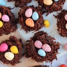 chocolate nests with candy eggs on a plate