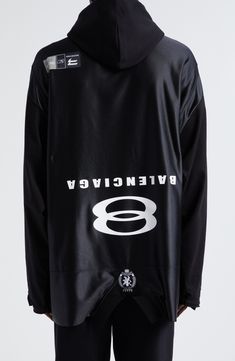 The label's Infinity logo hints at limitless comfort in an oversized hoodie with a fleece front and a high-shine back featuring an upside-down sports jersey. 32" length (size 2) Fixed hood Dropped shoulders Lined hood 100% cotton with 100% polyester contrast Machine wash, line dry Made in Portugal Designer Clothing Hooded Streetwear Outerwear With Logo Detail, Hooded Outerwear With Logo Detail For Streetwear, Black Logo Detail Outerwear For Streetwear, Luxury Black Sweatshirt For Streetwear, Luxury Black Hoodie With Logo Print, Luxury Hoodie With Drawstring Hood For Streetwear, Luxury Hooded Hoodie For Streetwear, Luxury Black Hoodie With Ribbed Cuffs, Luxury Streetwear Hoodie With Logo Detail