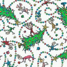 an image of a very colorful christmas tree with cats and dogs on it's side