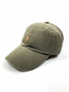 This baseball cap is an easy way to add a dose of the season's vibrant color to your off-duty look. It's garment-washed to create cool variations in tone, and the chino fabric will only get better with wear. DETAILS                                 Seamed bill. Six-panel construction. Embroidered ventilating grommets. Multicolored signature embroidered pony at the center front. Embroidered "Polo" and a slider buckle at the back. Sweatband at the interior. Interior sweatband. 23" inner circumference. 100% cotton. Spot clean. Imported. Due to the natural characteristics of this material, the coloring may rub off onto fabrics and upholstery. PAYMENT I accept PayPal payments. Please pay as soon as the auction is finished or I will cancel the winning bid. If you don't plan on paying, please hold Classic Cotton Khaki Baseball Cap, Khaki Cotton Baseball Cap, Spring Khaki Cotton Baseball Cap, Casual Solid Color Canvas Hats, Khaki Cotton Dad Hat For Outdoor, Outdoor Khaki Cotton Baseball Cap, Khaki Cotton Visor Hat, Casual Khaki Six-panel Baseball Cap, Khaki Cotton Dad Hat With Curved Brim