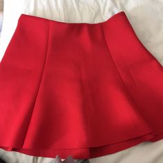 Bought At The Guess Store Perfect Condition - Nwot Really Cute With Tights & A Sweater. Can Be Dressed Up Or Down. Zipper Back. Size: Medium 90% Polyester, 10% Spandex Approx Measurements: 14” Waist, Length 15-16”, Hips 17-18” Red A-line Mini Skirt For Spring, Solid A-line Bottoms For Party, Red A-line Party Bottoms, A-line Stretch Bottoms For Party, Red A-line Mini Skirt Lined, Stretch A-line Party Bottoms, A-line Stretch Party Bottoms, Red A-line Bottoms For Party, Chic Red Flared Skort