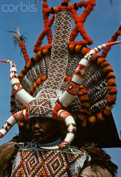 a man in an elaborately decorated headdress