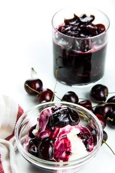 cherries and ice cream in a bowl on a white surface with the words make with ingredients