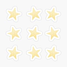 six yellow stars stickers on a white background, all in different shapes and sizes