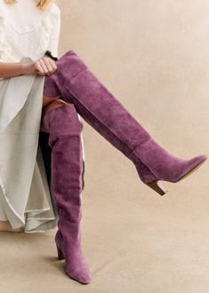 High heel thigh-high boots;Made in our Portuguese atelier;Interior zip fastening system;Split leather exterior;Leather lining and insole;Leather and rubber outsole;Leather laminated heel;Heel height: 7 cm / 2.8 in;Tone-on-tone metal zip Mauve Outfit, Mauve Shoes, Pink Ankle Boots, Shoes Fashion Photography, Thigh High Boots Flat, Purple Boots, Purple Suede, Boho Casual, Pretty Shoes